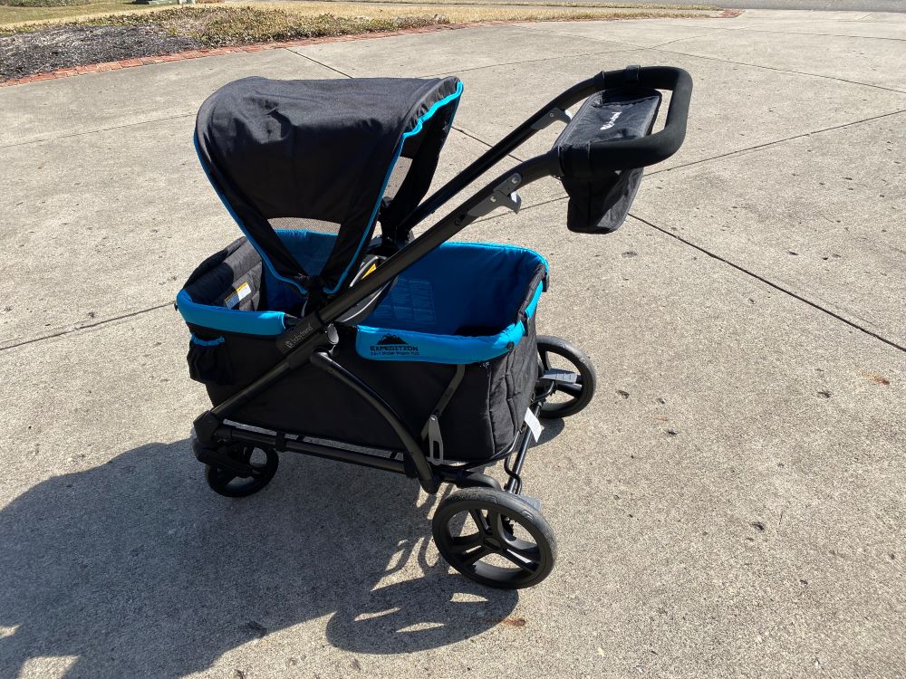 baby trend expedition stroller wagon outside in the sun