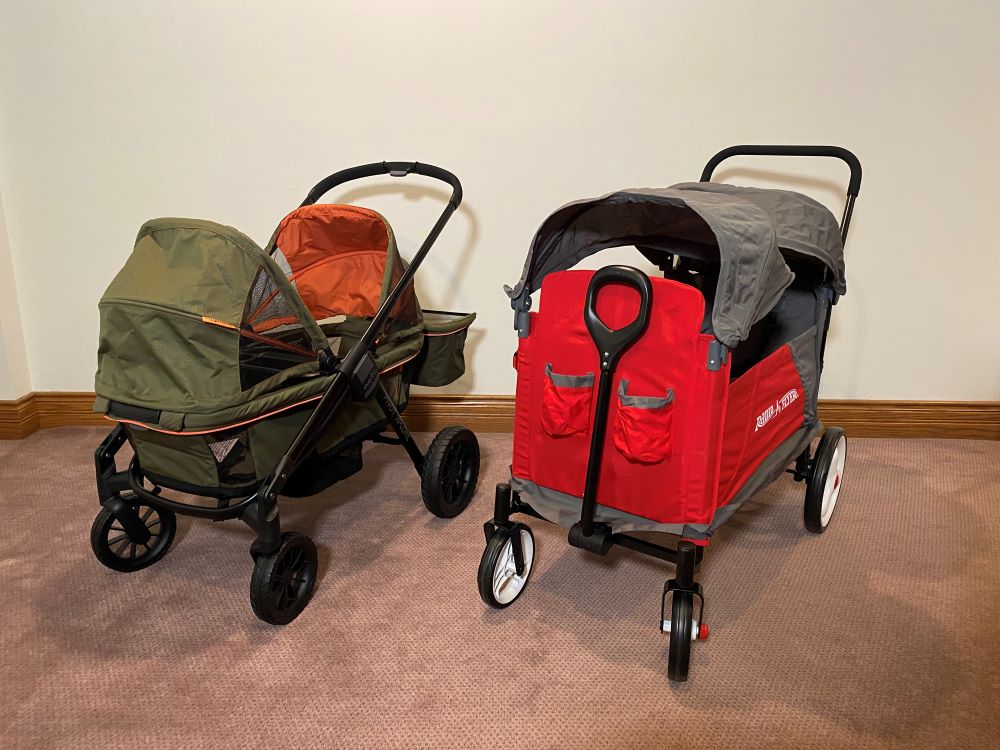 The radio flyer discovery stroll n wagon side-by-side with the Evenflo pivot xplore stroller wagon