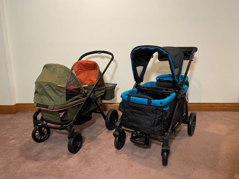 The evenflo pivot xplore stroller wagon sitting next to the baby trend expedition