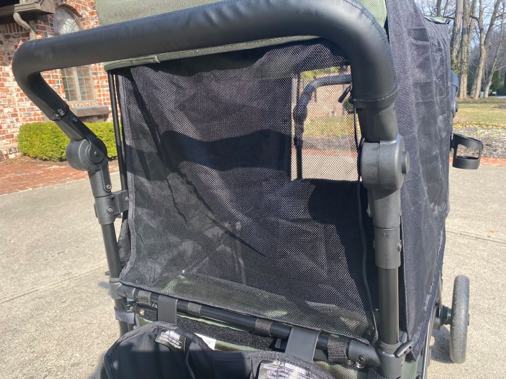 mosquito netting rolls down from the jeep wrangler canopy