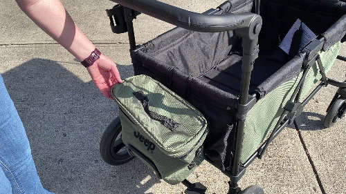 a mom opening the insulated jeep cooler bag