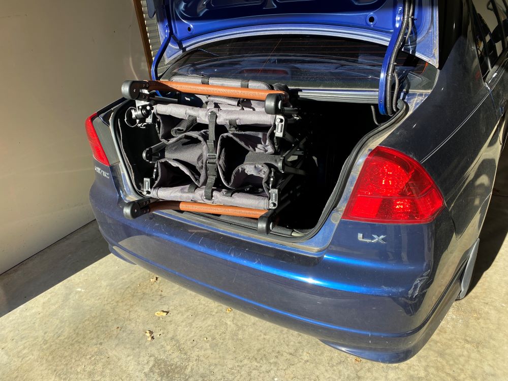 Trying to fit the Keenz in the trunk of a honda civic