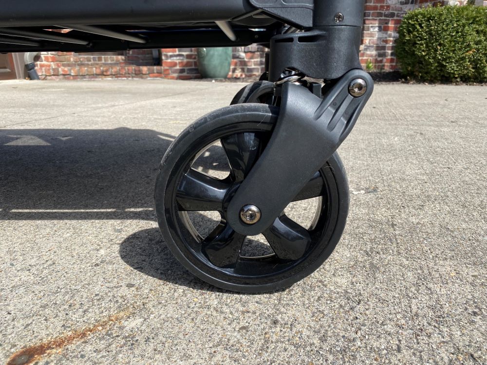 Wonderfold W4 Elite front wheel showing spring suspension