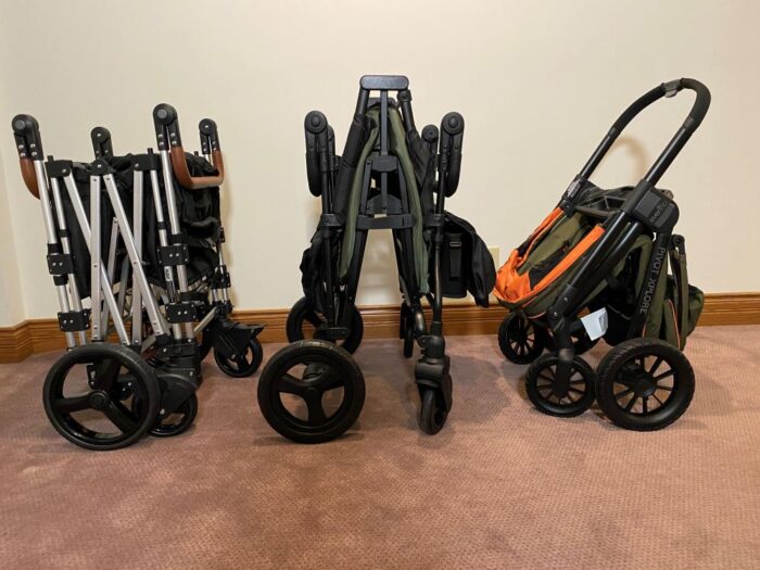 The Keenz 7S, Jeep Wrangler and Evenflo Xplore standing folded indoors