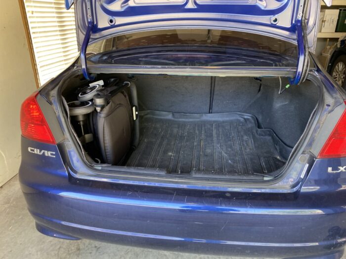 joolz aer showed in a honda civic trunk up against the side with plenty of extra space.