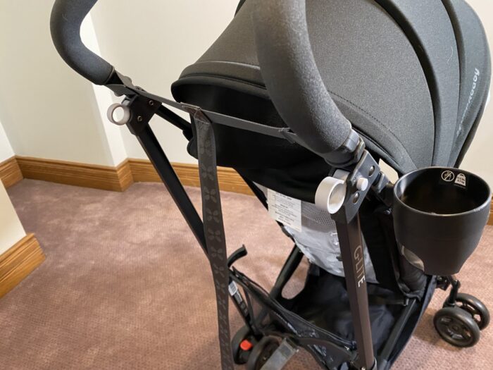 showing back of stroller and cup holder