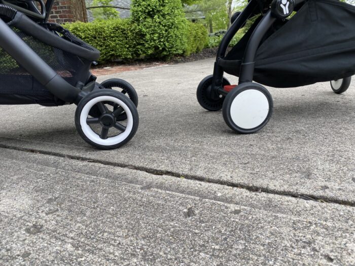 rear wheels of the bugaboo and YoYo² strollers with the YoYo² on the right
