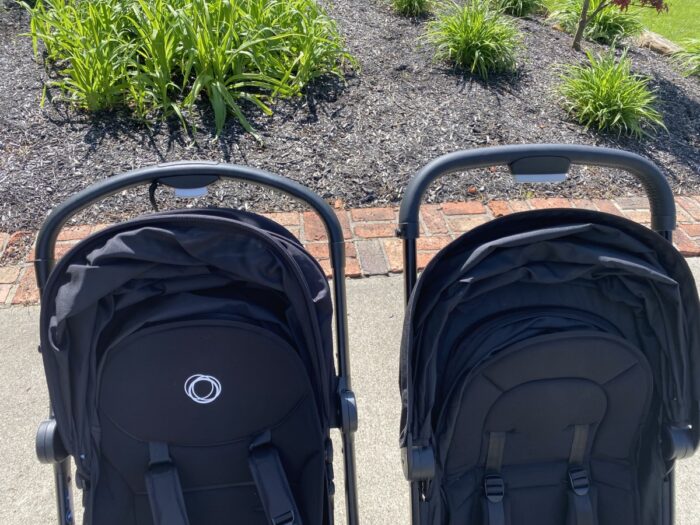 showing the tops of the handlebars with the bugaboo on the left and joolz on the left.