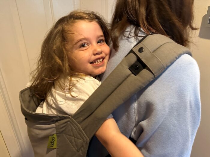 Shot of 4-year-old in Boba back carry