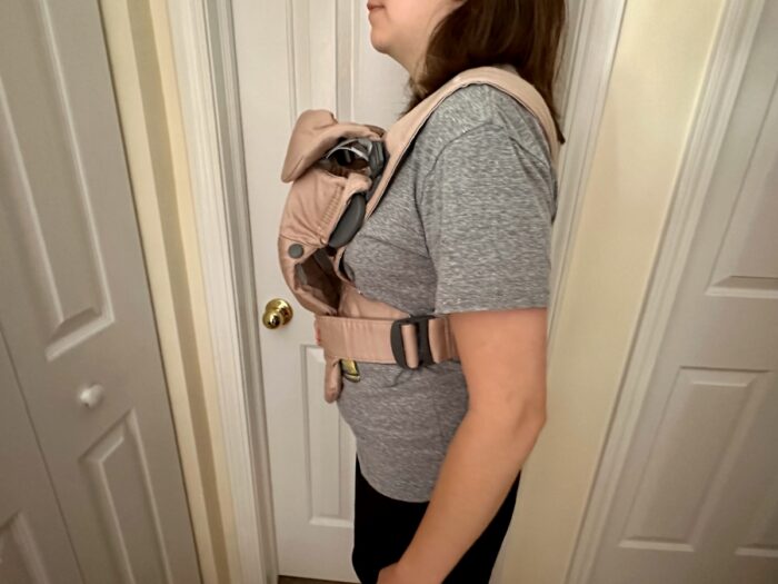 Side view of BabyBjorn Mini sitting higher on waist