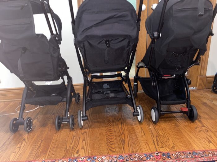 Back view of strollers showing baskets, Left to right: gb Pockit+, Cybex Libelle, Babyzen YoYo2.